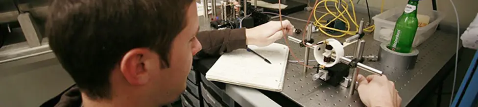 A student works in the Applied Magnetics Laboratory.